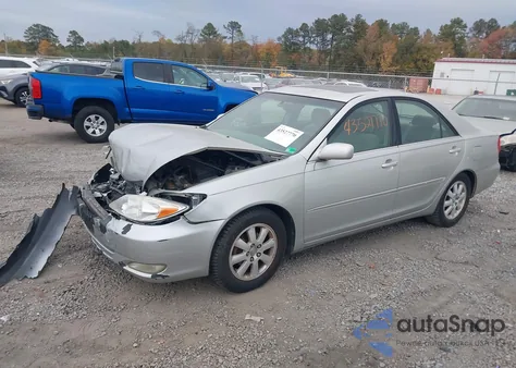2003 Toyota Camry Xle z USA, uszkodzony, nr VIN 4T1BE30K53U680290